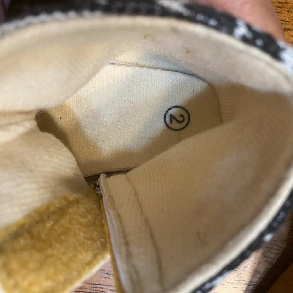 Child of mine and unbranded pair of boots. (2pair) Size 2.  Infant winter boots.